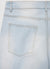 Shorts in denim effetto slavato con risvolto